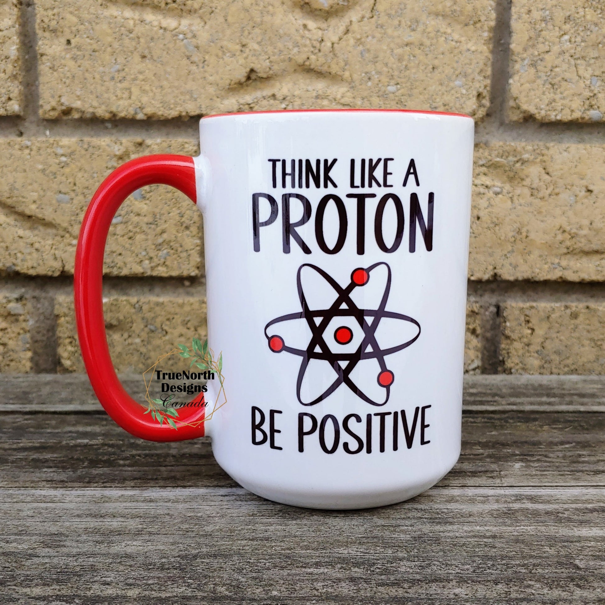 Think Like A Proton, Be Positive Mug TNDCanada