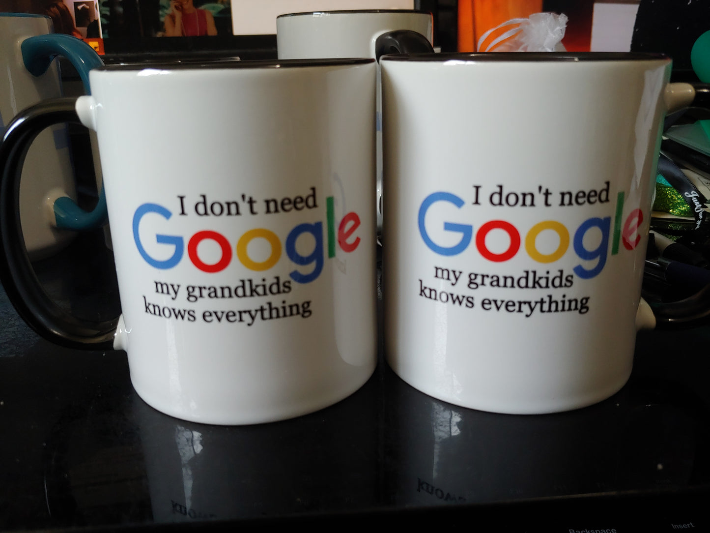 I Don't Know Google my grandkids knows everything (11oz black inner/handle mug w/design on both sides, grammatical error)
