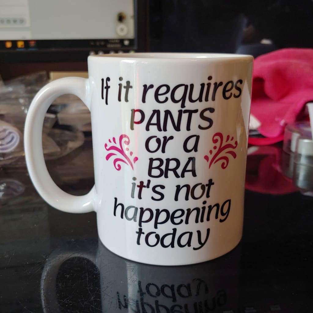 If it requires pants or a bra it's not happening (11oz white mug w/design on one side, slight fading on bottom of design) TNDCanada