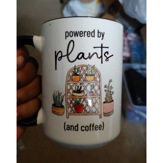 Powered by plants and coffee mug (15oz black inner/handle mug w/blemishes on one side of the design) TNDCanada