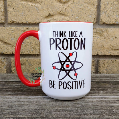 Think Like A Proton, Be Positive Mug TNDCanada